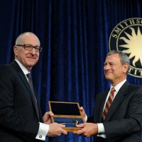 Dr. David Skorton receives the ceremonial key to the Smithsonian from Chief Justice of the United States John Roberts, Oct. 19, 2015. (Photo by Joyce Boghosian)