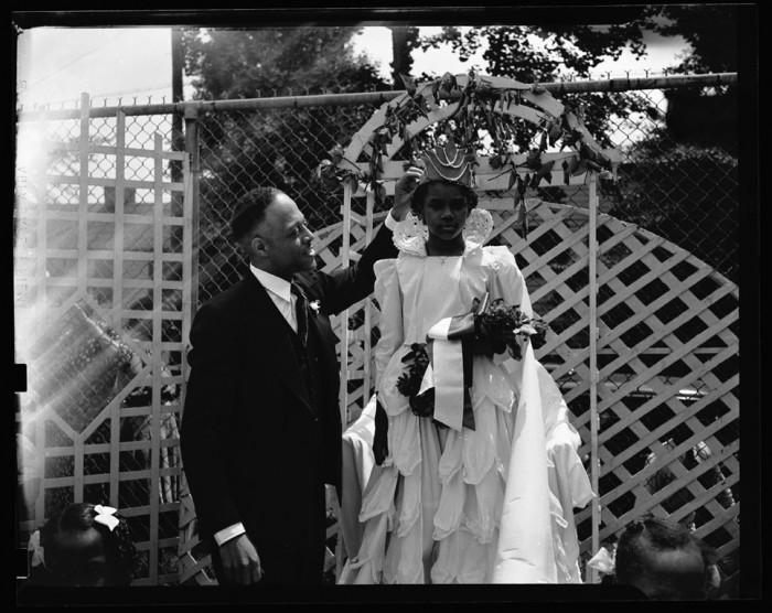 Young girl is crowned the May Queen