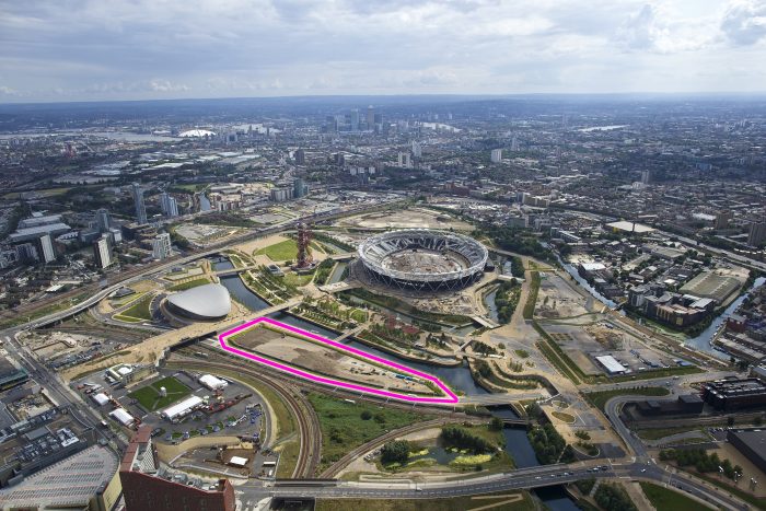 Aerial view of Queen Elizabeth Olympic Park with site outlined in pink