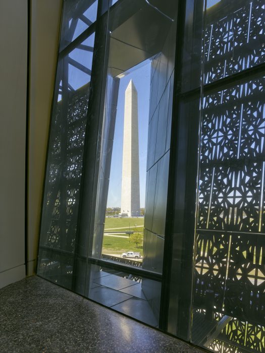 he Washington Monument as seen from the interior of the Smithsonian's National Museum of African American history and Culture, April 13, 2016. Architectural photo by Alan Karchmer