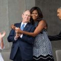 George Bush and Michelle Obama hug at dedication ceremony for NMAAHC