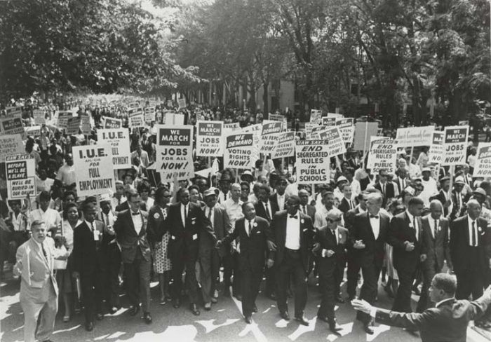 Marchers carrying signs