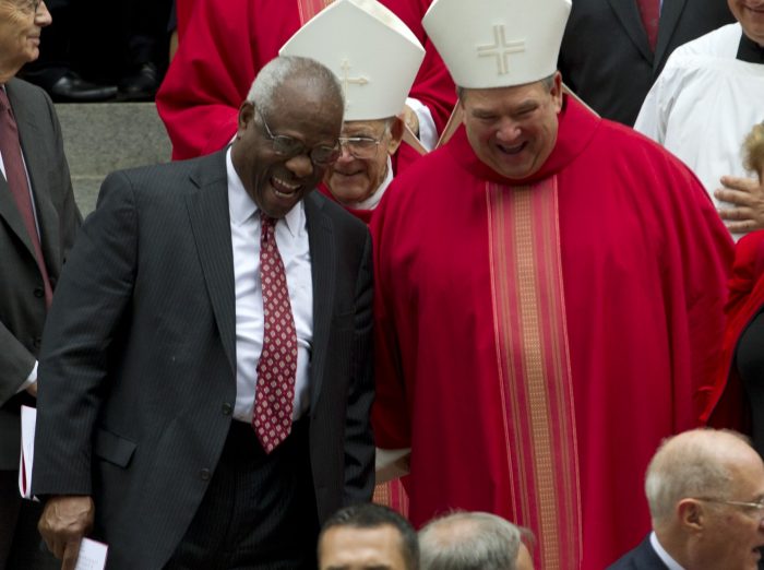 Thomas laughing with unidentifiied Catholic cardinal