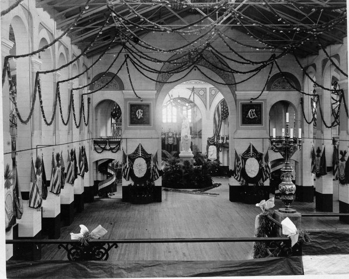 Interior of A&I building with bunting and flags