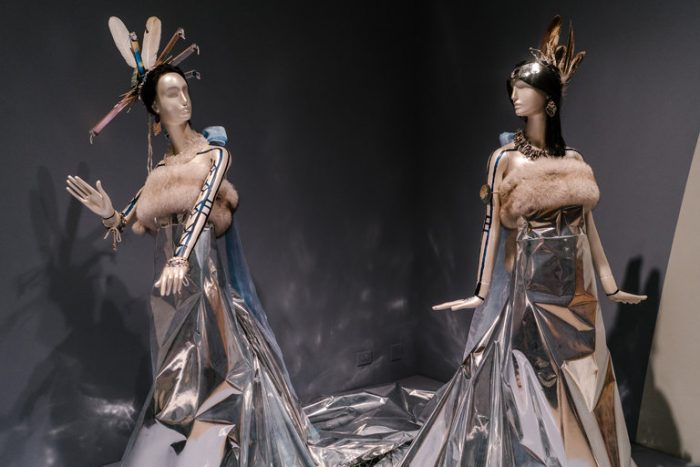 Dresses and accessories displayed on mannequins