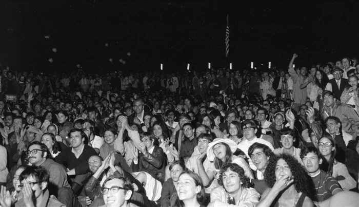 Black and white photo of rapt crowd