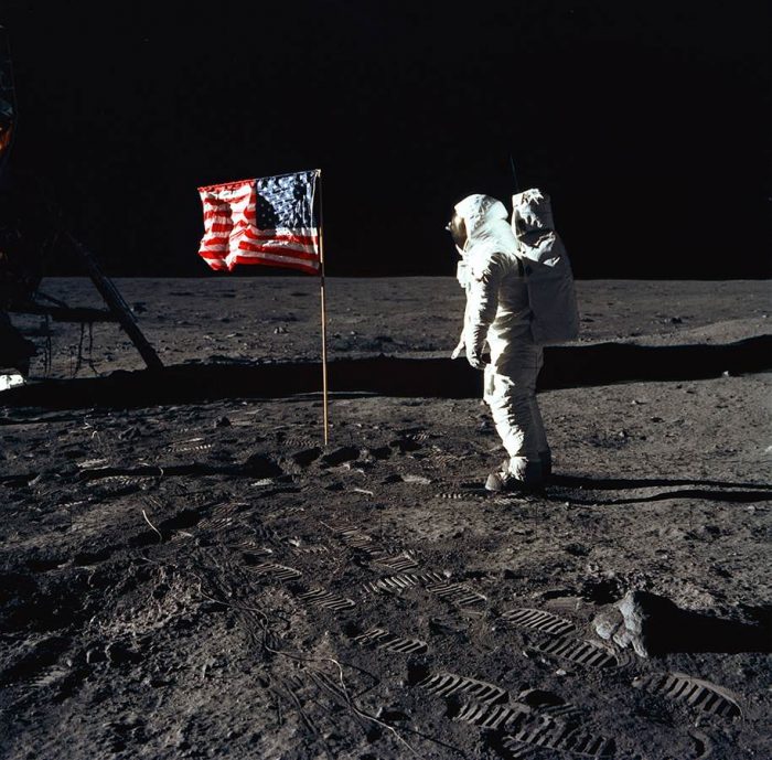 Aldrin next to flag on moon's surface