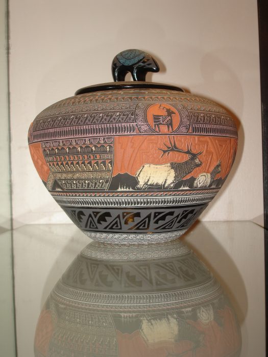 Pottery vase with Native American designs