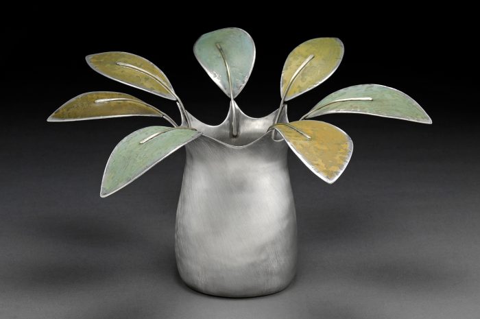 Vase with metal petals