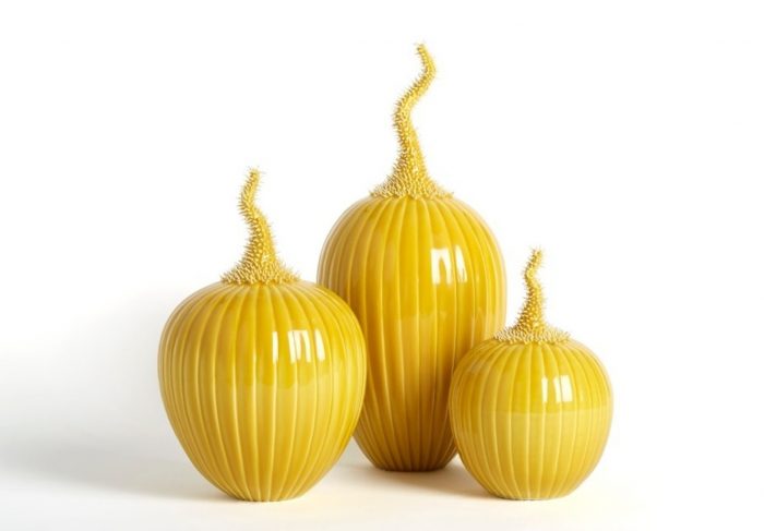 Three yellow vessels with stems