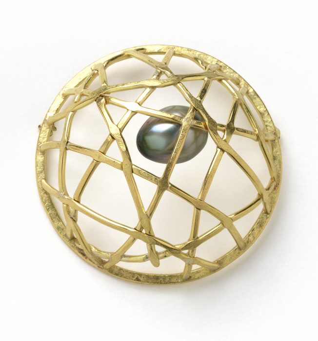 Gold basket with pearl egg