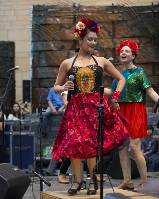 Performers in colorful costumes