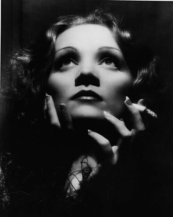 Black and white close-up of Dietrich with cigarette