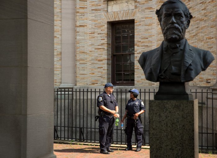 Bust of Robert E Lee with officers in background