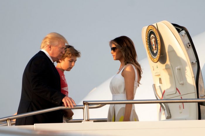 Melania Trump in white dress and family