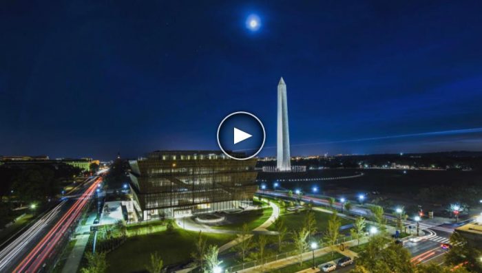 Screenshot of aerial view of African American Museum at night