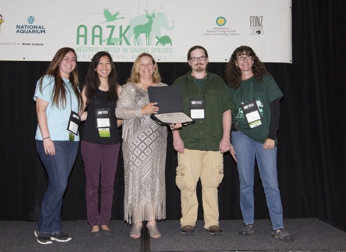 Team members accept AAZK Award