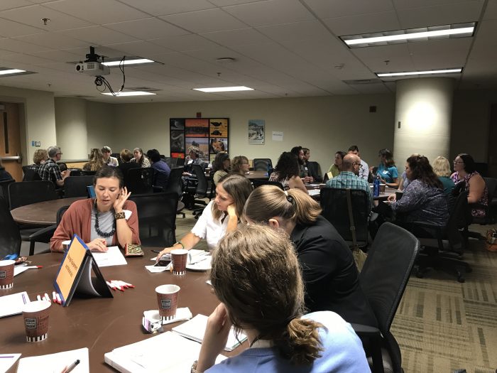 Breakout discussion groups at several tables