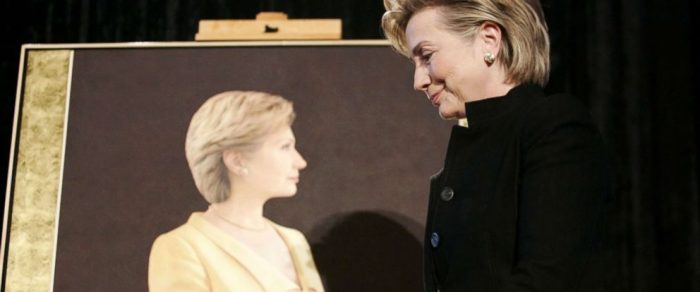 Hillary Clinton with her portrait