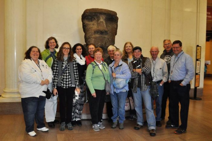 Group shot in front of tiki god
