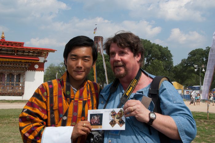 Tinsley poses for photo with young Tibetan man