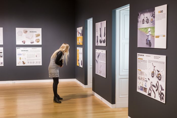 Girl in gallery looking at exhibits