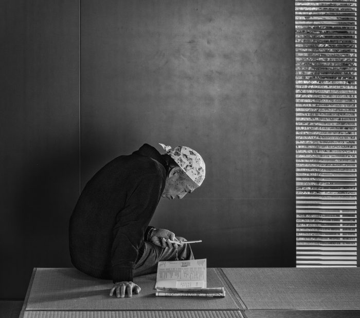 A visitor lost in thought at Tokyo's Suzuki Museum