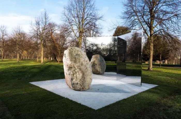 outdoor sculpture of stone and mirrors