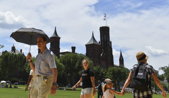 Visitors in forefront, Castle in background