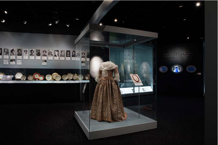 Gown in display case