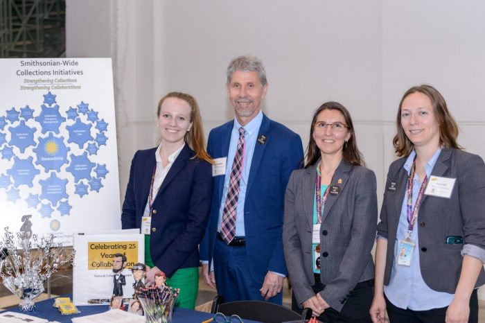 Group shot at presentation table