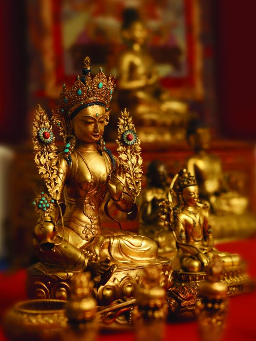 Gold statue of Buddha with jewels