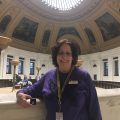 Kleiman holding pin poses in rotunda