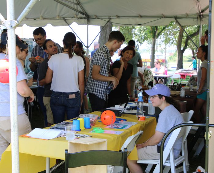 People visiting information tables