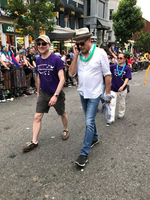 Davis and Heffner walk in Pride parade