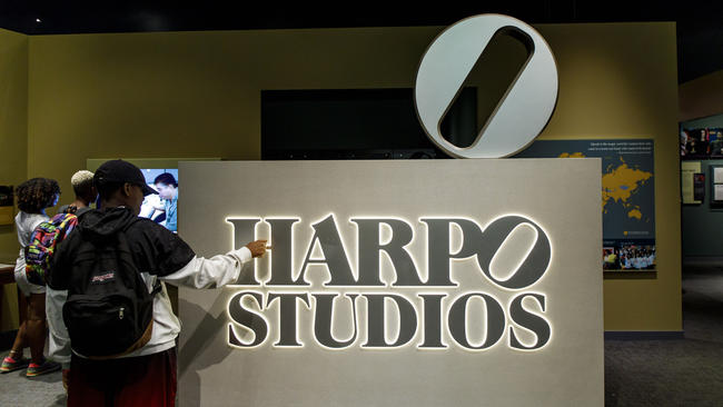 Visitor examines Harpo Studios sign