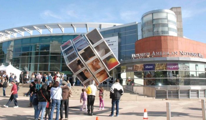 Museum exterior with people in plaza