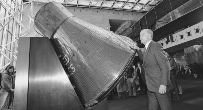 Glenn with Apollo capsule