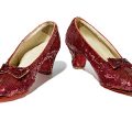 Ruby slippers on white background