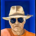 Brightly colored portrait of man wearing hat and sunglasses