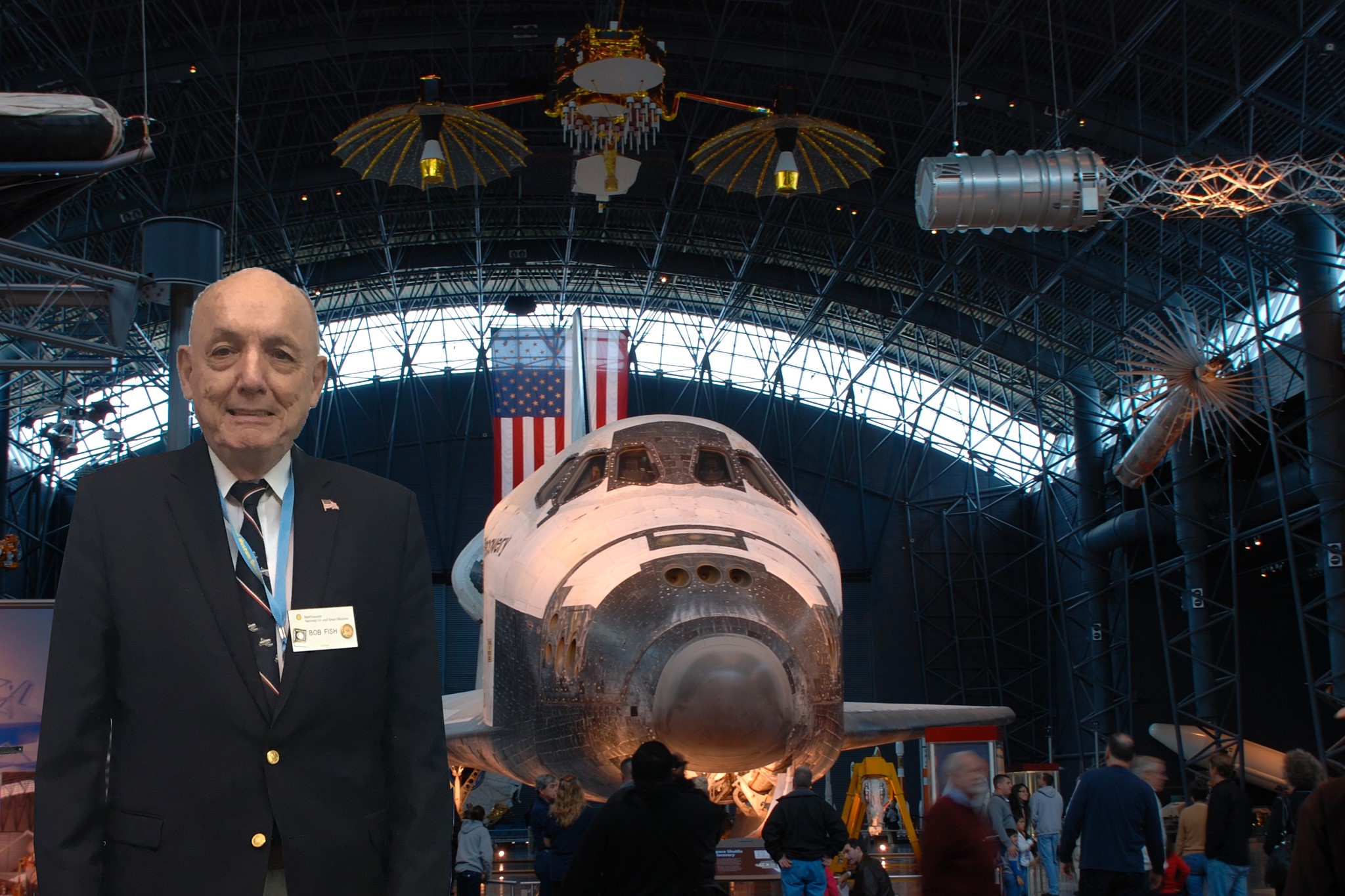 Fish poses in front of space shuttle