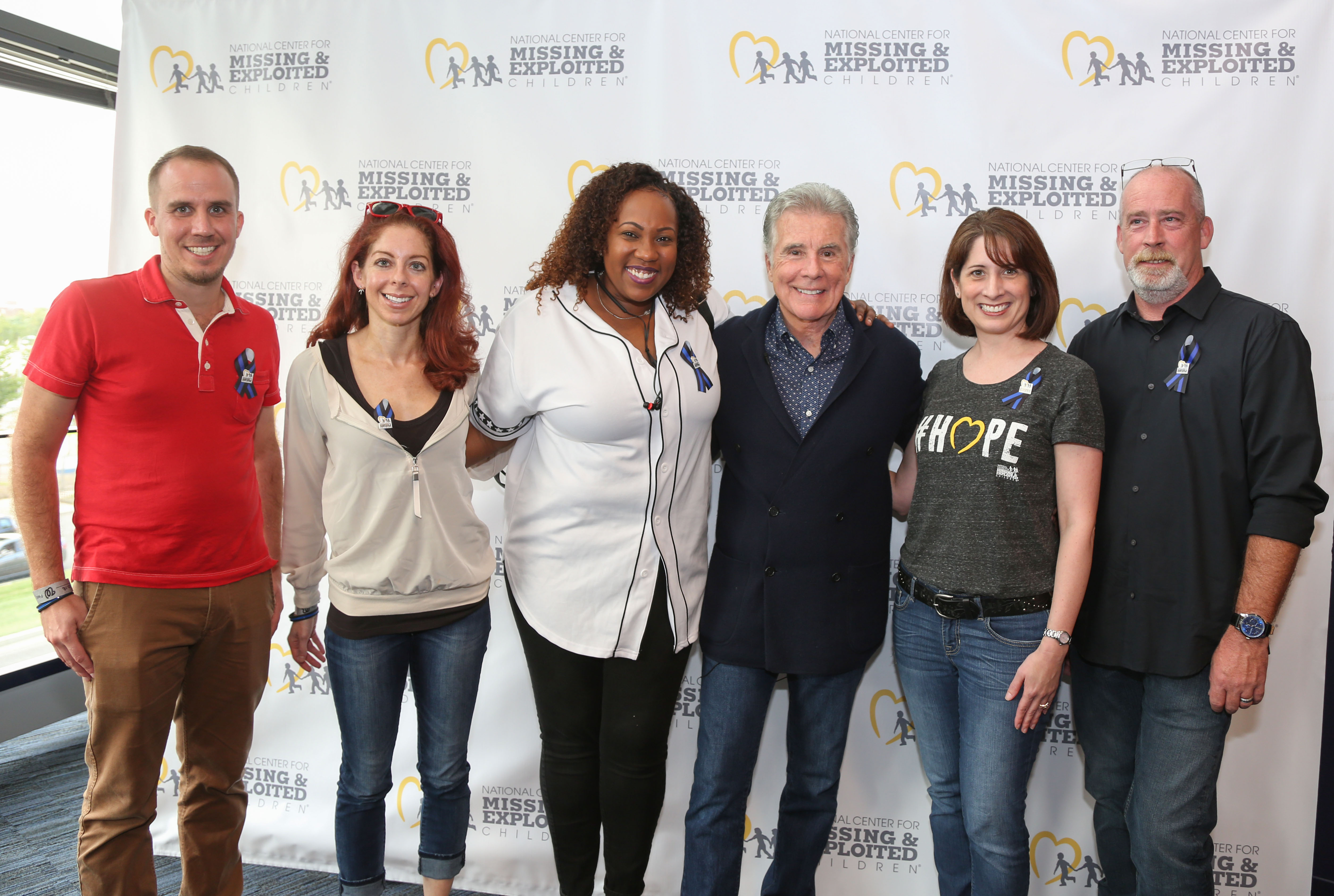 Recipients in front of step and repeat screen