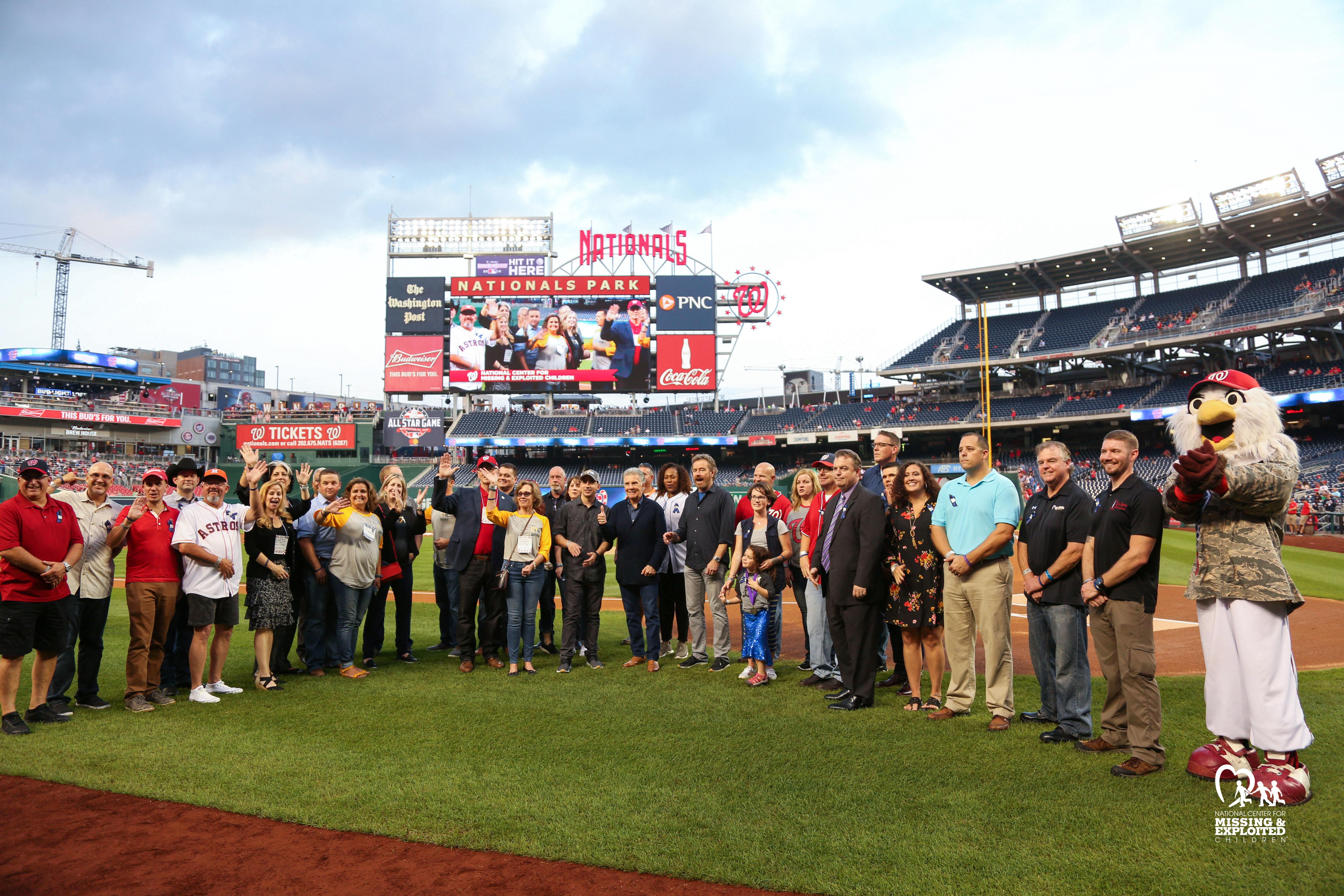 Recipients gathered on ballfield