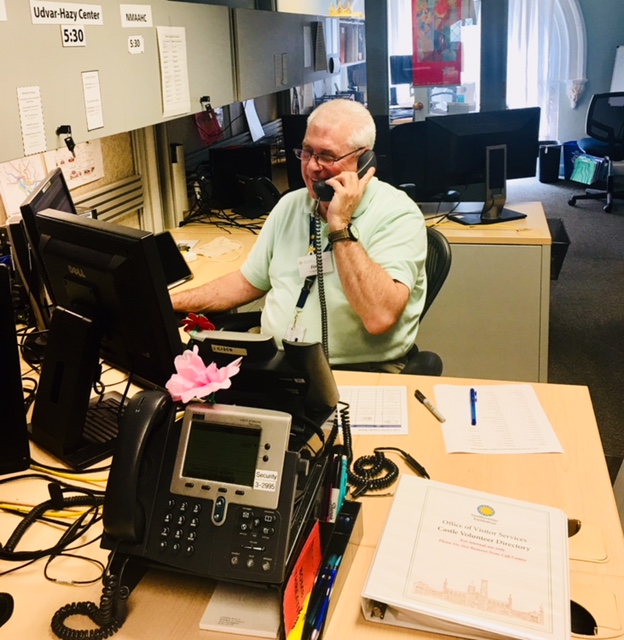 Volunteer Jim Peterson on the phone in the call center