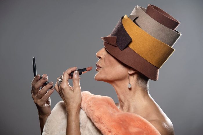 Model wearing NMAAHC-inspired hat