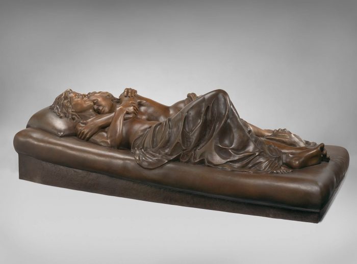 Bronze sculpture of reclining couple
