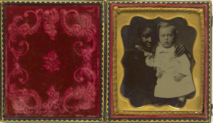 Tintype of black woman with white baby