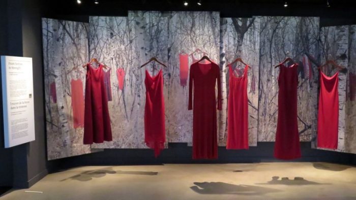 Installation of red dresses on hangars
