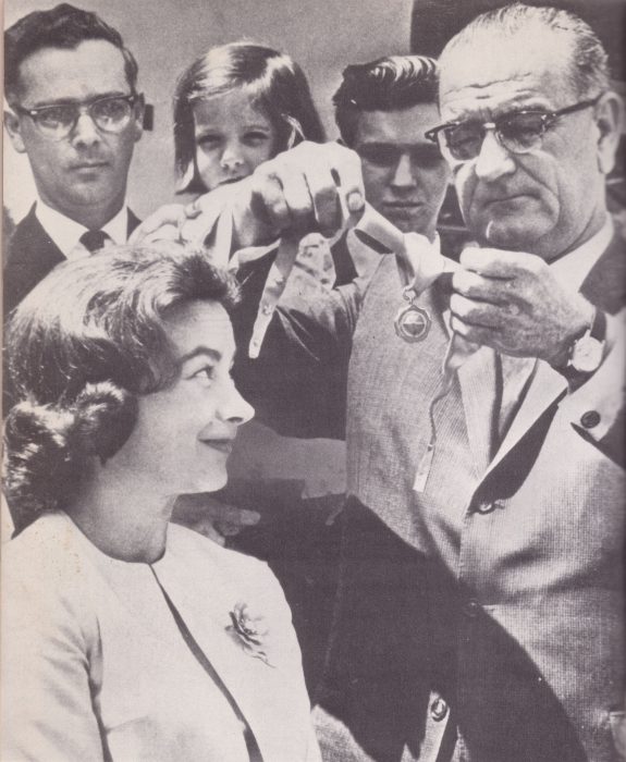 Mock receives award from President Johnson