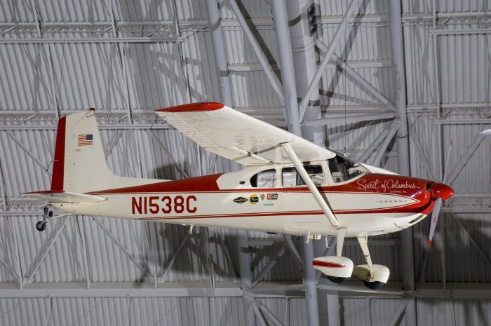Plane suspended from hangar ceiling